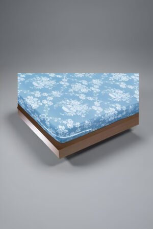 Funda blanca de colchón 90x190 cm colocada sobre cama individual.